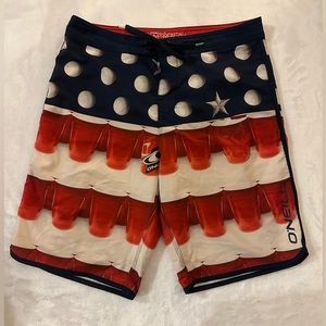 O’Neill size 31 Beer Pong board shorts. Red, White & blue. Excellent condition.